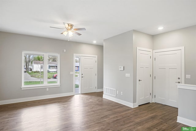 entryway featuring ceiling fan and dark hardwood / wood-style flooring