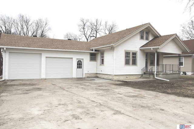 ranch-style home with a garage