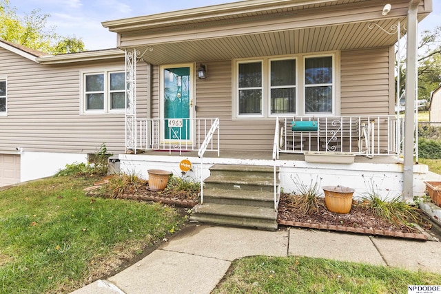 entrance to property with covered porch