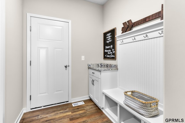 mudroom with dark hardwood / wood-style flooring