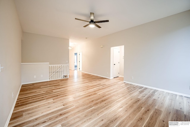 spare room with ceiling fan and light hardwood / wood-style floors