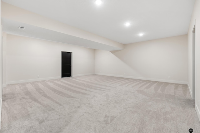 basement with light carpet