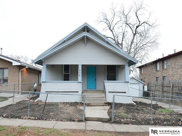 bungalow featuring covered porch