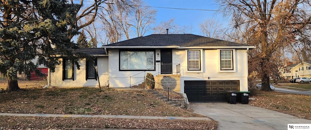 view of front of property featuring a garage