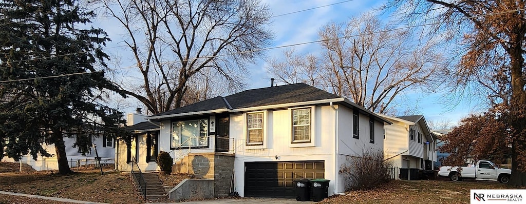 view of front of house with a garage