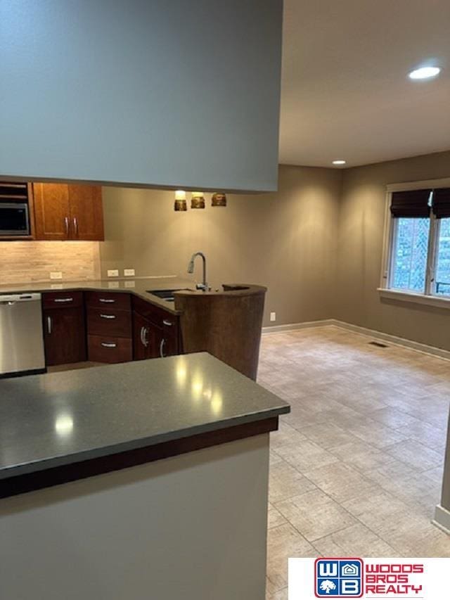 kitchen with sink and appliances with stainless steel finishes