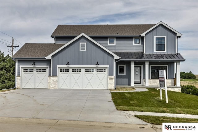 craftsman inspired home with a porch, a garage, and a front yard