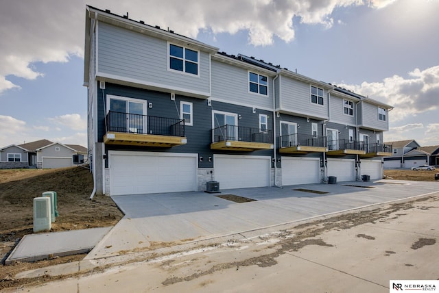 view of front of house featuring cooling unit