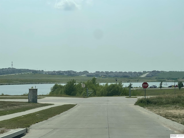 view of street featuring a water view