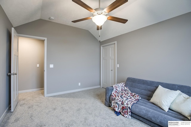 sitting room featuring light colored carpet, ceiling fan, and lofted ceiling