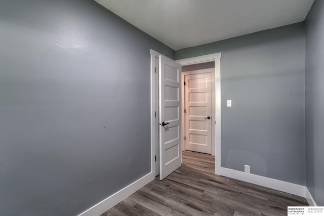 unfurnished room featuring hardwood / wood-style floors