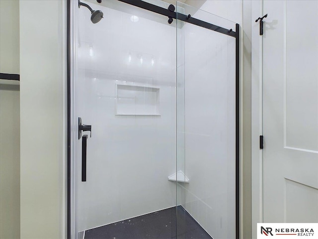 bathroom with an enclosed shower