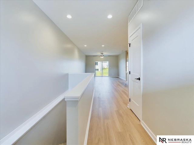 hallway featuring light hardwood / wood-style flooring