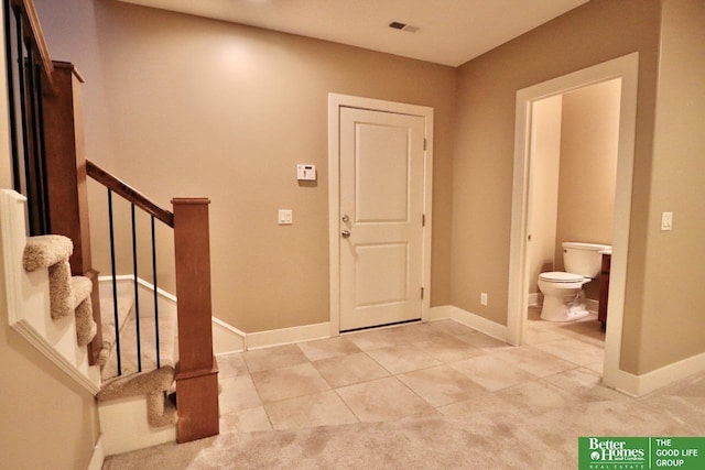 view of tiled foyer entrance