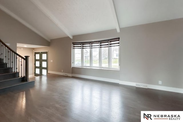 unfurnished living room featuring beamed ceiling, a textured ceiling, and high vaulted ceiling