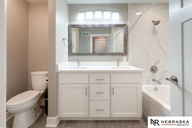 bathroom with vanity, wood-type flooring, and toilet