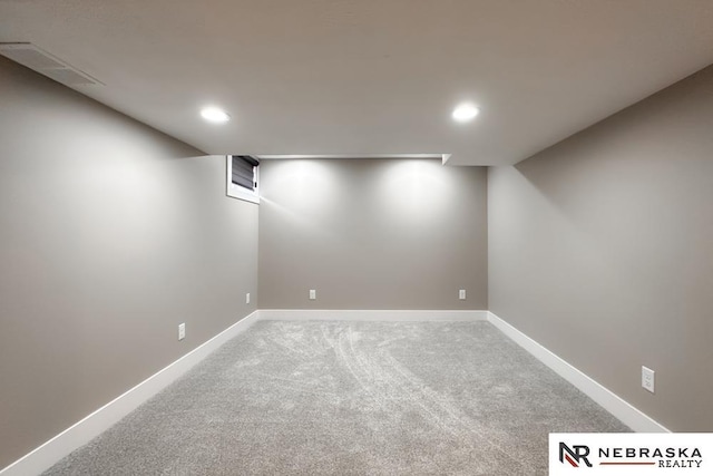 basement featuring carpet flooring