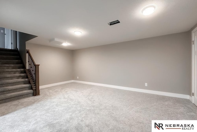 basement with carpet flooring