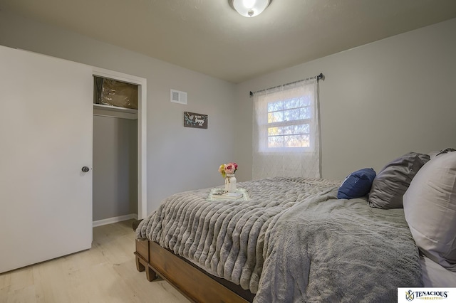 bedroom featuring light wood-type flooring