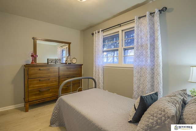 bedroom featuring light hardwood / wood-style floors