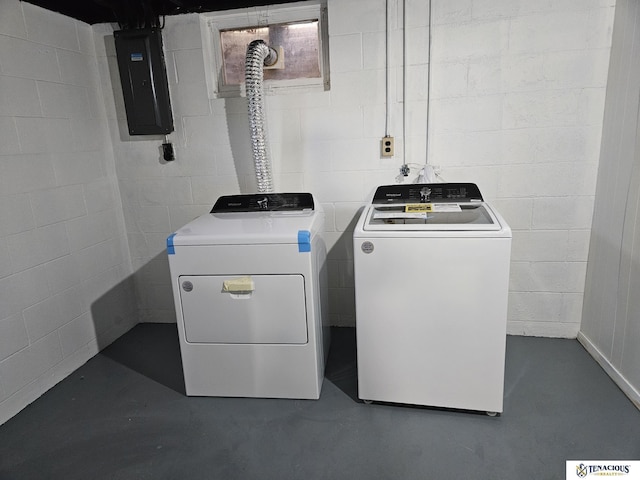 washroom with independent washer and dryer and electric panel