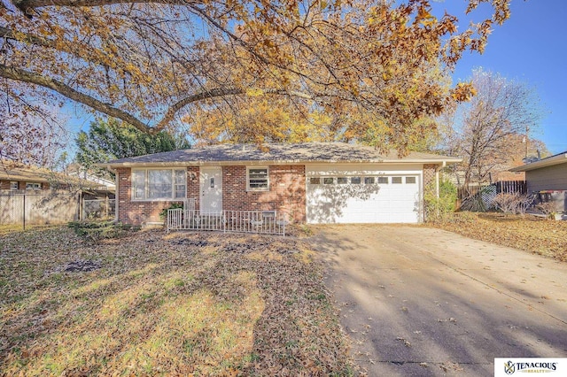 single story home featuring a garage