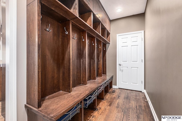 mudroom featuring dark wood-type flooring