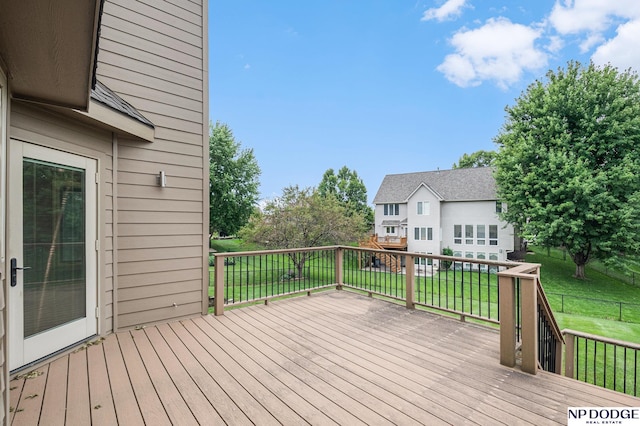 deck featuring a yard