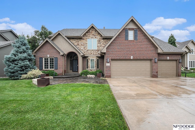 view of front facade featuring a front lawn and a garage