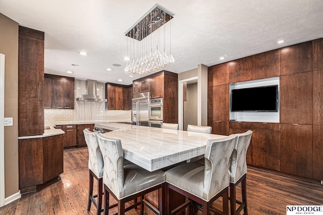 dining space featuring dark hardwood / wood-style flooring