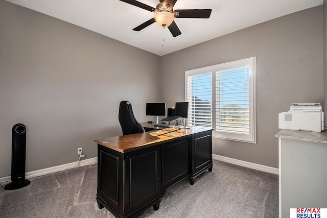 carpeted office featuring ceiling fan