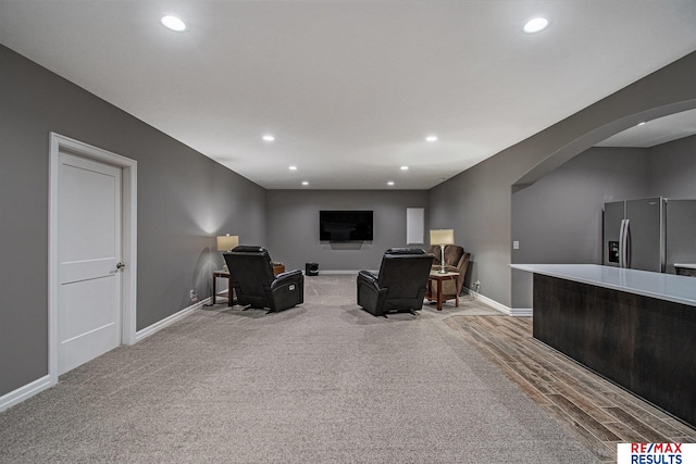 living room featuring light carpet