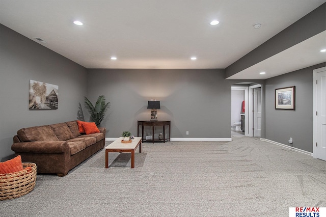 living room with light colored carpet