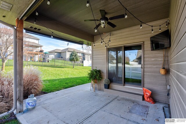 view of patio / terrace featuring ceiling fan