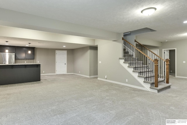 unfurnished living room with light carpet, recessed lighting, stairs, and baseboards