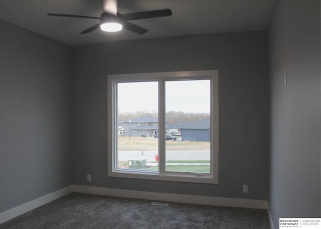 unfurnished room with carpet floors and ceiling fan