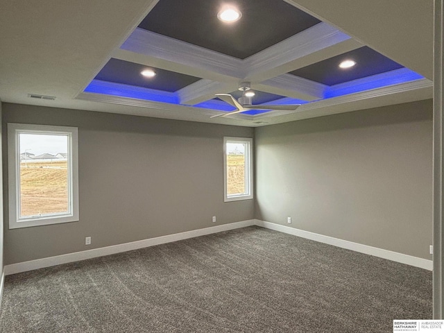 carpeted spare room featuring coffered ceiling