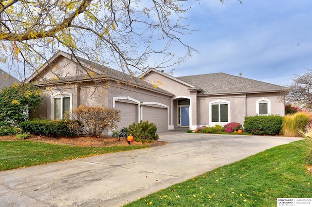 view of front of property with a garage