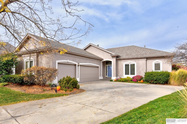 view of front of property with a garage