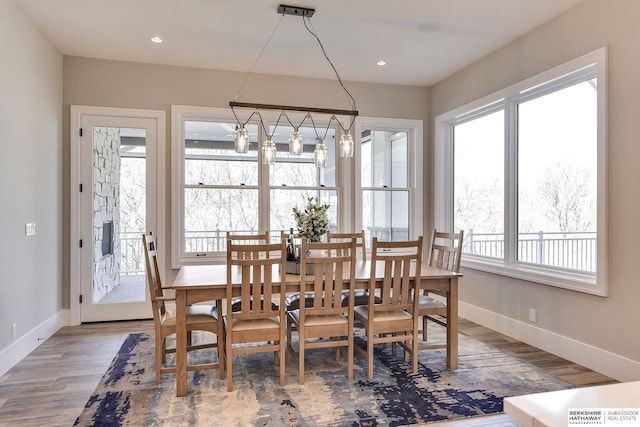 dining room featuring an inviting chandelier and dark wood-type flooring