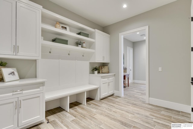 mudroom with light wood-type flooring