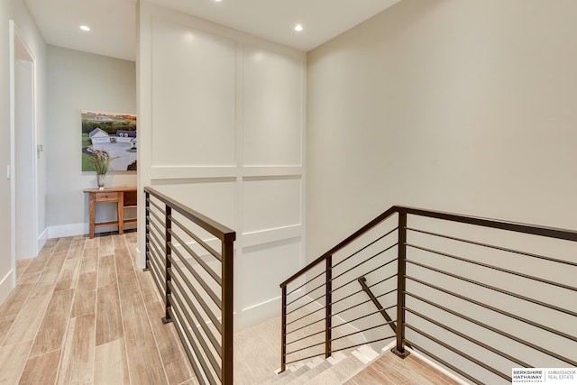 corridor featuring light hardwood / wood-style flooring