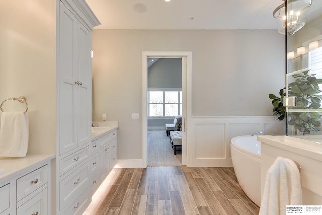 bathroom featuring vanity and a bathing tub