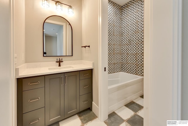 bathroom featuring vanity and  shower combination