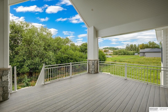 deck featuring a yard