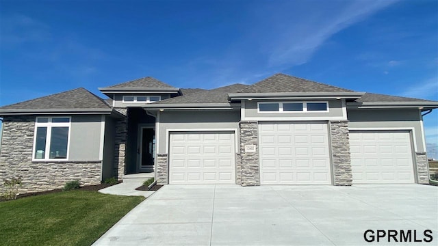 prairie-style home with a garage