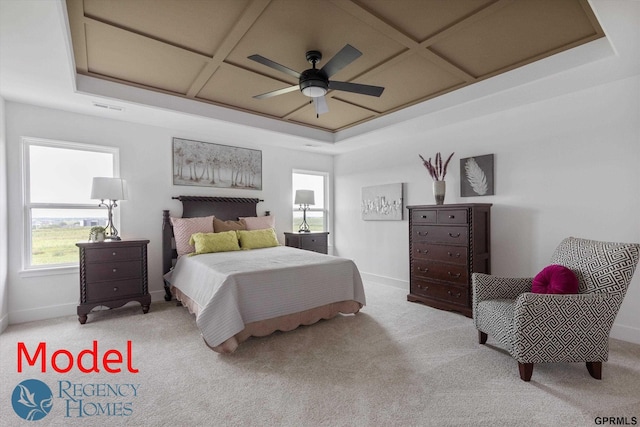 carpeted bedroom with ceiling fan and coffered ceiling