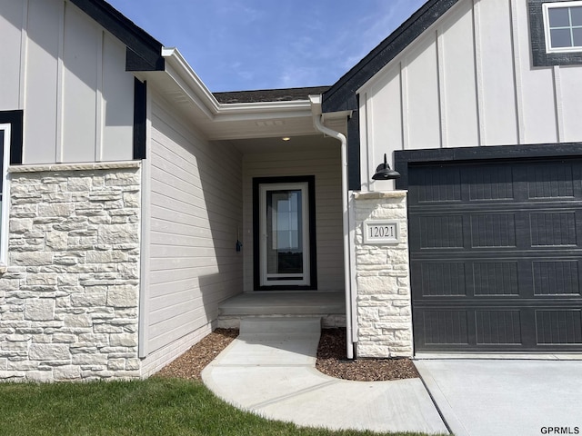 property entrance featuring a garage