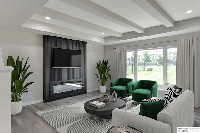 living room with beamed ceiling and light hardwood / wood-style floors