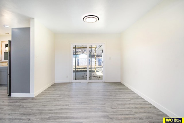 empty room featuring light wood-type flooring